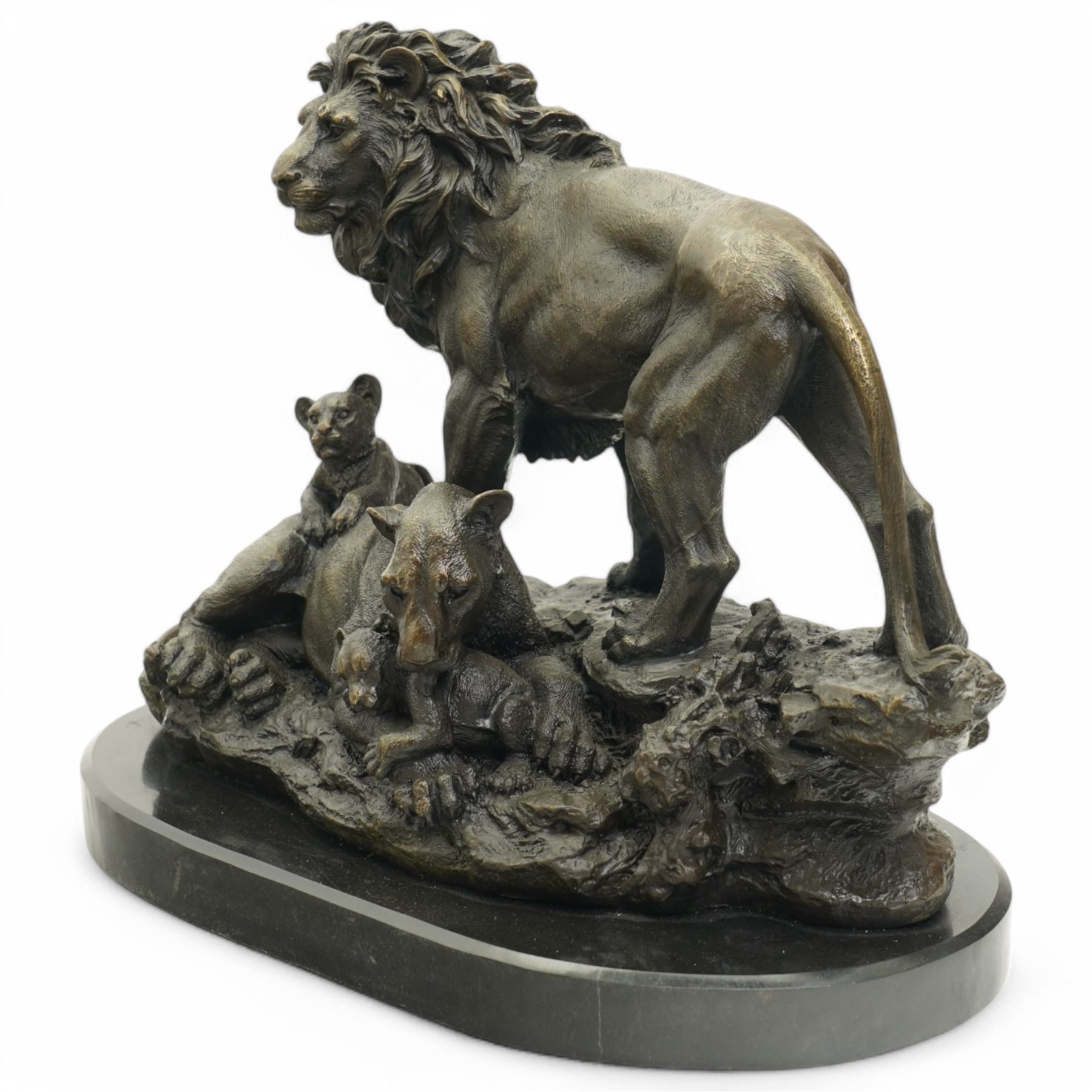 After Barye - Bronzed big cat family group of lion, lioness and two cubs on oval marble base 31cm x 36cm