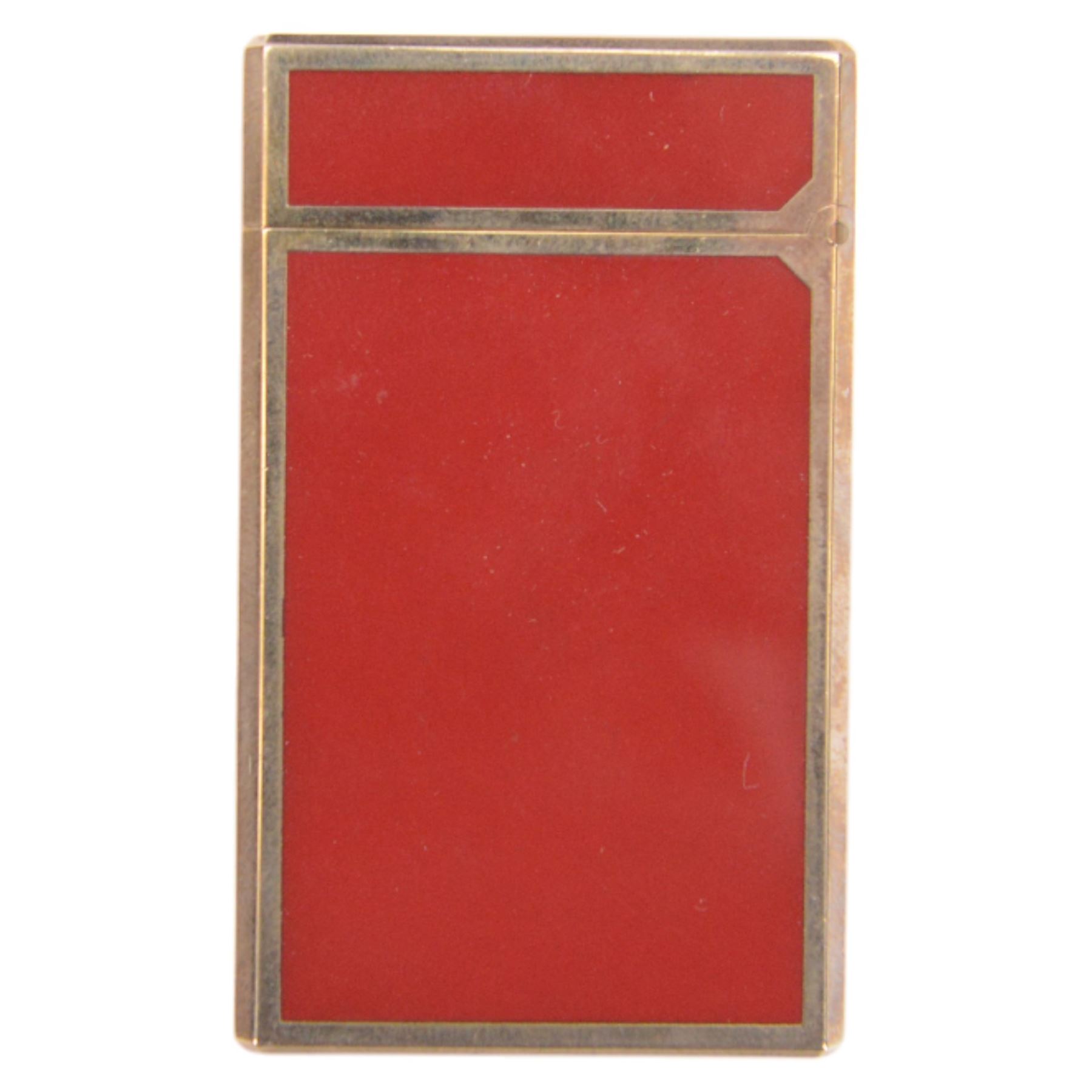 Two S.T. Dupont lighters, comprising red laque-de-chine example, boxed and a gold-plated textured example