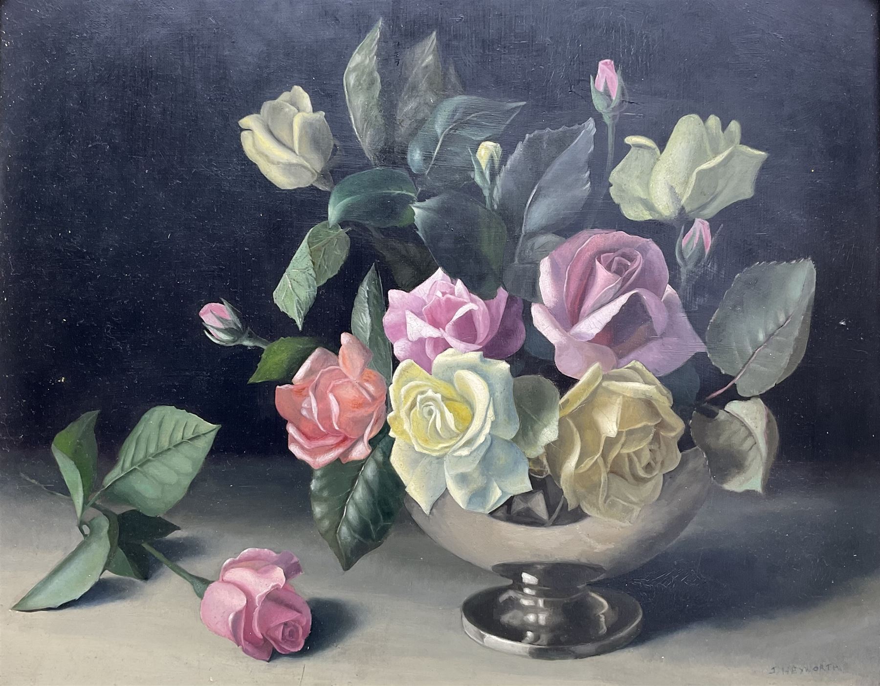 Jack Heyworth (20th century): Still Life of Roses, oil on board signed, artist's 'Haslingden' address label verso 39cm x 49cm