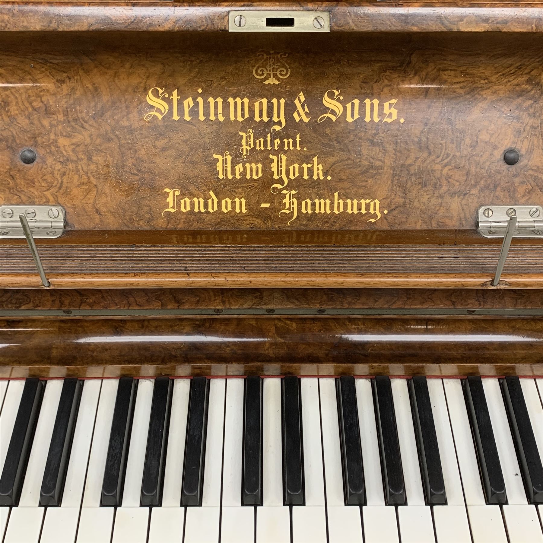 Steinway & Sons - late 19th century figured walnut upright piano, iron framed and overstrung, model no. 56174 circa. 1886, W154cm, H137cm, D70cm, together with a quantity of sheet music