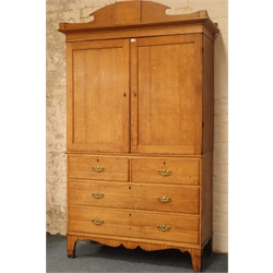  19th century oak linen press cupboard on chest, two panelled doors enclosing shelves, two short and three long drawers, bracket feet, W133cm, H225cm, D57cm  
