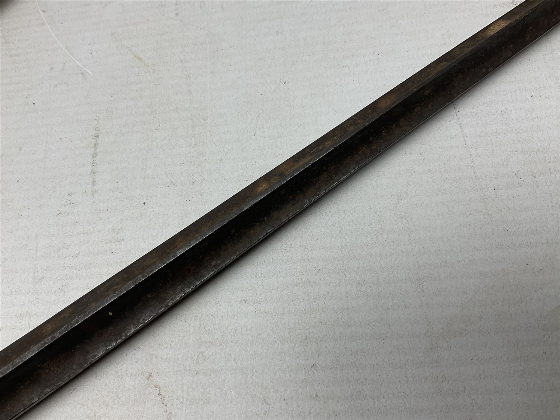 French model 1866 sabre bayonet, the 57.5cm curving blade marked St. Etienne 1873; in associated steel scabbard L71cm; and Mosin-Nagant M1891 socket bayonet with 43cm cruciform blade No.37068 (no scabbard) (2)