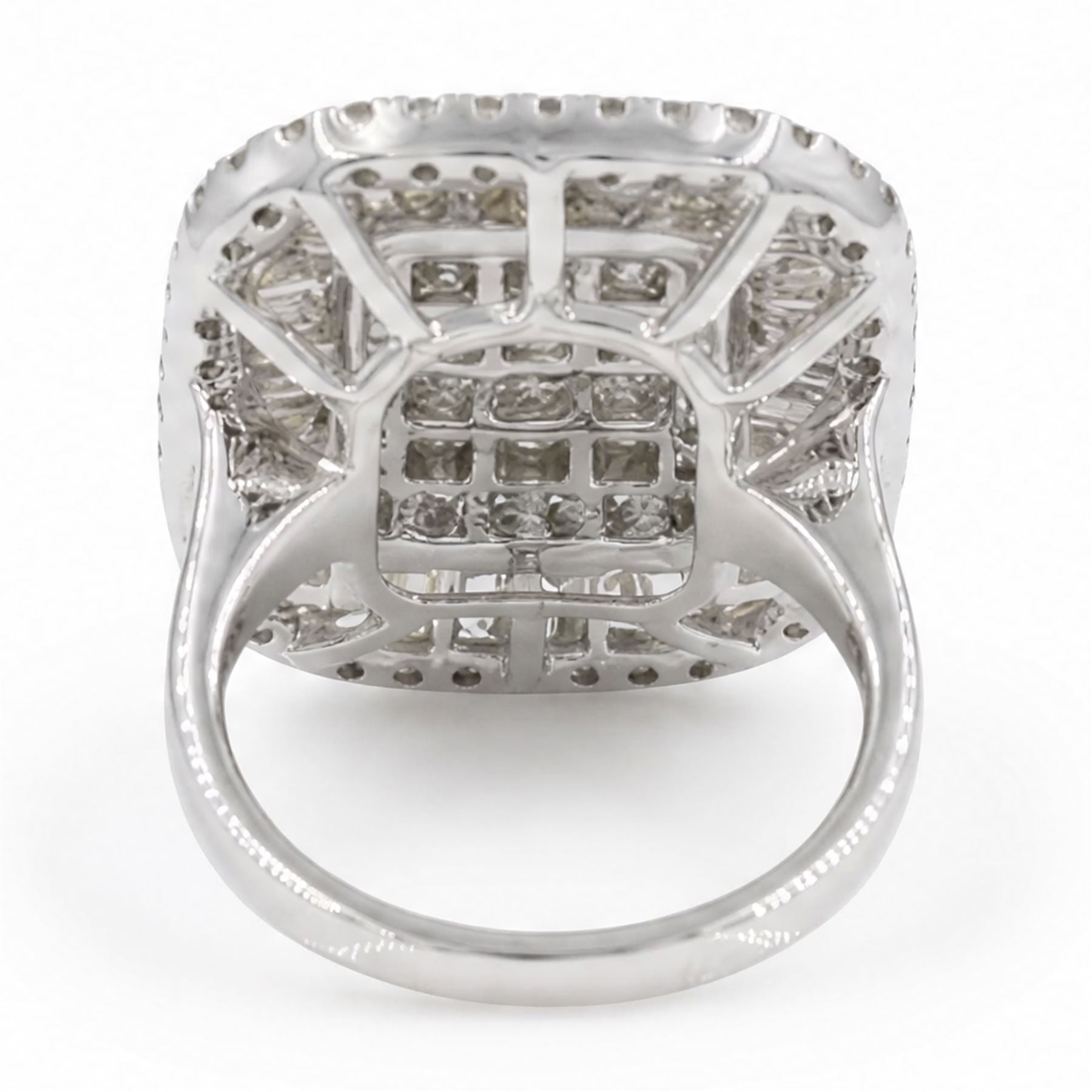 White gold diamond cluster ring, pave set with princess cut, baguette cut and round brilliant cut diamonds, hallmarked 9ct, total diamond weight 3.40 carat