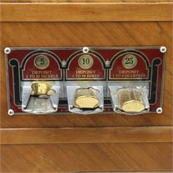 Rudolf Wurlitzer Company - Model 616 'Simplex' 1937 jukebox, figured walnut veneered cabinet with illuminated red and amber side panels enclosed by chromed uprights, glazed upper record compartment, cast Art Deco speaker grille, coin-operated push-button selection panel with circular title index, raised on a moulded base