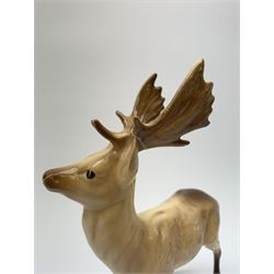 A Beswick Deer family, comprising Stag, Doe and Fawn. (3).  