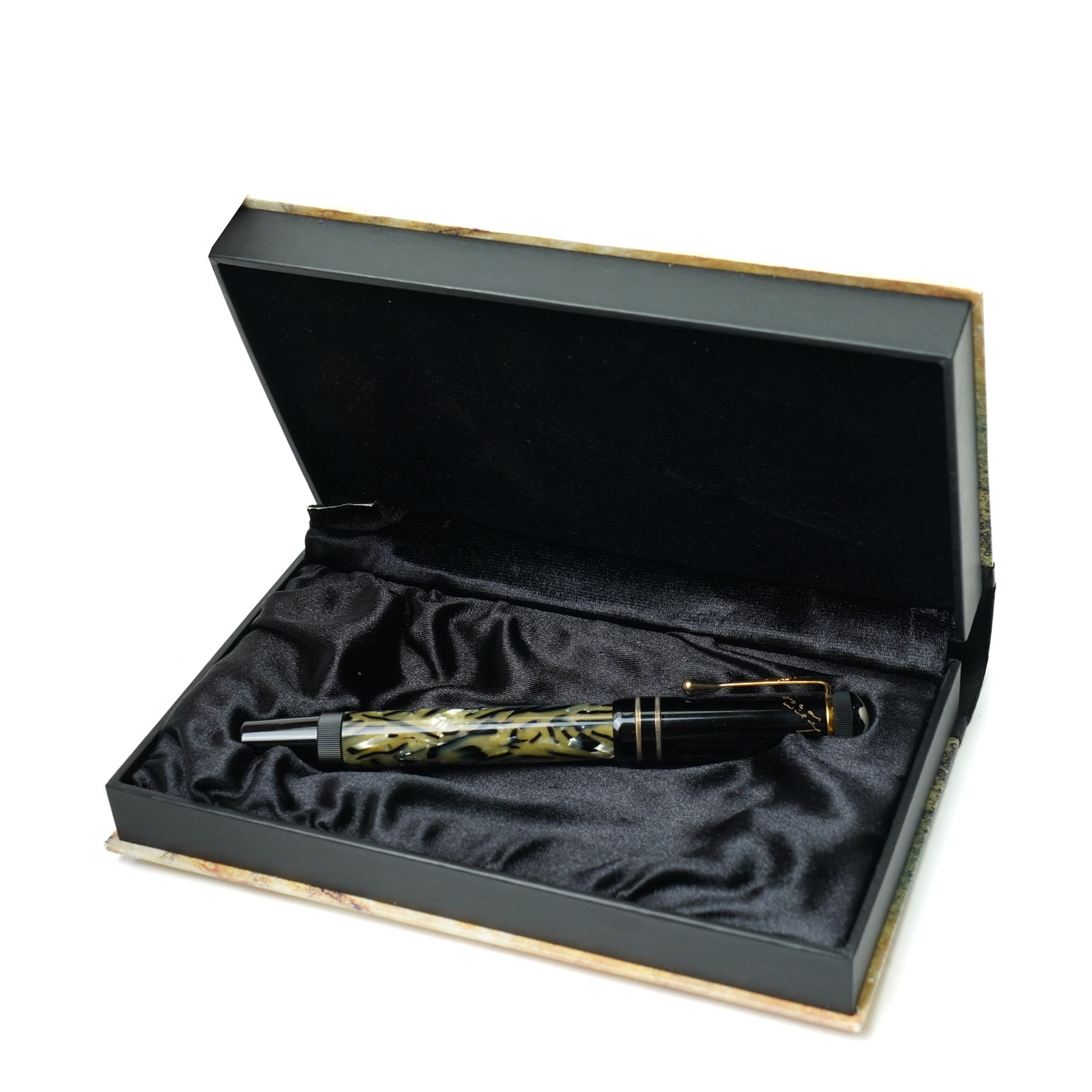 Montblanc Meisterstück Oscar Wilde limited edition fountain pen, black resin cap and barrel with marbled ivory and black patterned lower barrel and gold-plated fittings, the cap signed with Oscar Wilde facsimile and surmounted by the white star emblem, fitted with a medium 18K (750) gold nib engraved 4810, 1994 and MONTBLANC, model no. 28616, presented in original lined fitted case in the form of a book with outer box