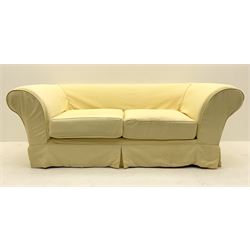 Pair traditional two seat sofas upholstered in pale yellow cover 