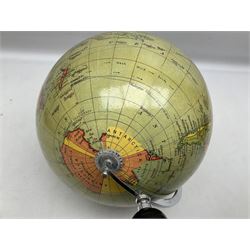 Terrestrial globe set in a wood stand, H46cm