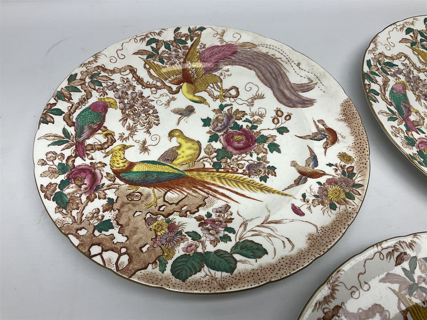 Five early 20th century Royal Crown Derby Olde Avesbury pattern dinner plates, decorated with oriental pheasants, butterflies and other birds amongst flowering branches, with impressed and printed marks to reverse, D26.5cm