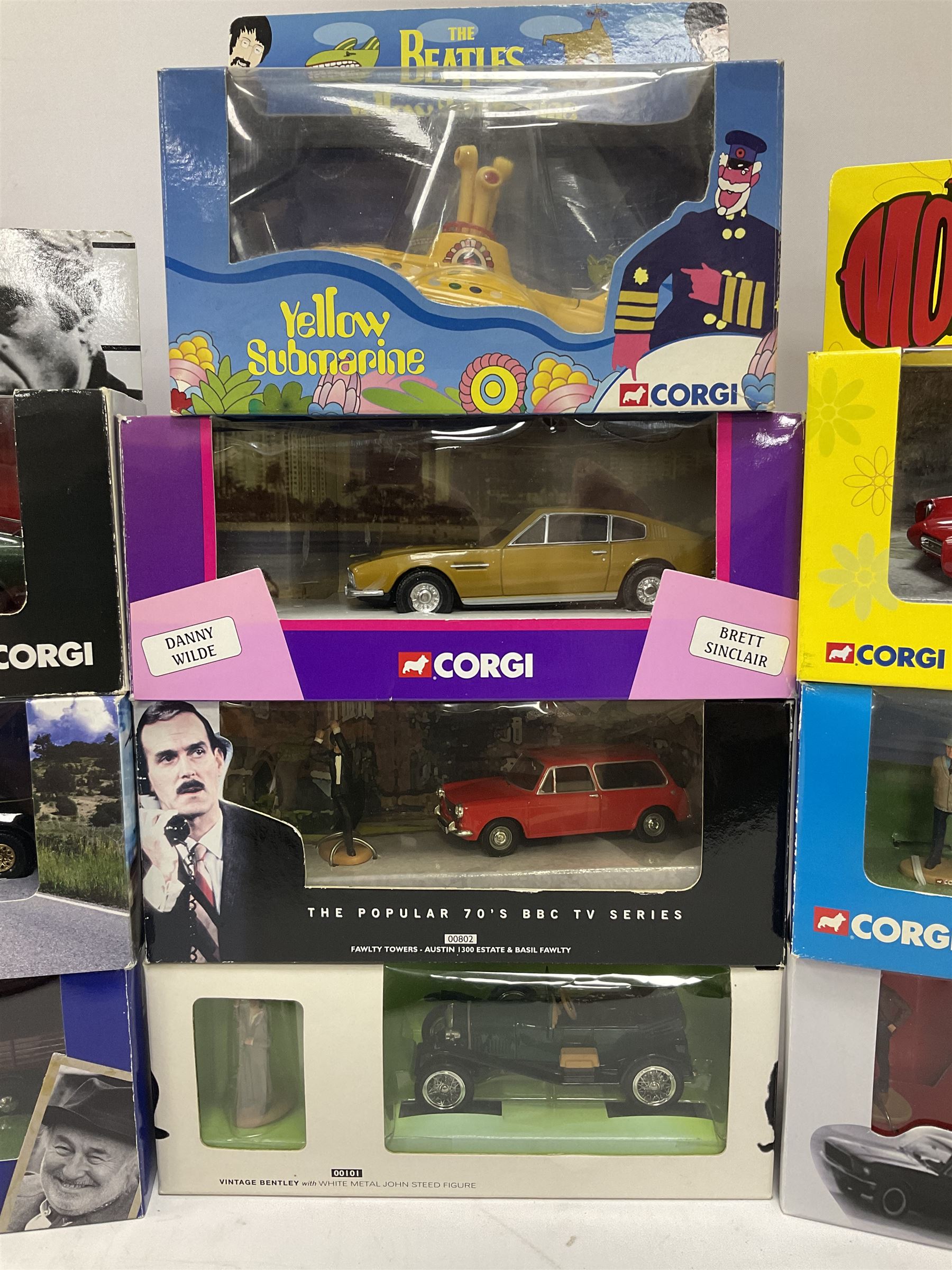 Corgi - sixteen TV/Film related die-cast models including Fawlty Towers, Bullitt, Beatles, Buster, Mr. Bean, Some Mothers,  Monkees, Ballykissangel, Heartbeat, The Avengers, Smokey & The Bandit etc; all boxed (16)