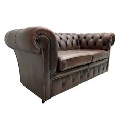 Chesterfield two seat sofa, upholstered in brown buttoned leather
