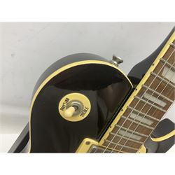 Aria Les Paul style electric guitar, no.037704CH L102cm; with amplifier, soft carrying case and stand; together with various guitar songbooks etc