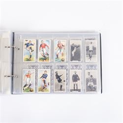 Collection of Edwardian and later Football related trading and cigarette cards, including forty-nine of fifty 1906 Ogden's Football Club Colours, 1922 PALS Footall series, ninety of one hundred 1925 Gallaher Famous Footballers, complete set of forty-four 1926 Ogden's Captains of Association Football Clubs and Colours, complete set of fifty 1927 Players Football Caricatures by MAC,  complete set of fifty 1927 Players Football Caricatures by RIP,  complete set of fifty 1930 Players Association Cup Winners, complete set of 50 1933 Ogdens AFC Nicknames etc, housed in brown cigarette card album