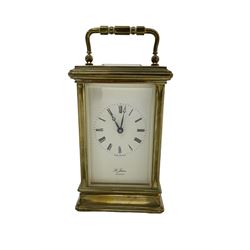 English - 20th century 8-day carriage clock, dial inscribed St James, London, dial with Roman numerals, minute markers and moon hands, lever platform escapement with eleven jewels. With key. 