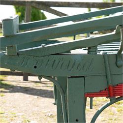Costermonger’s Cart

A painted costermonger’s cart with green slatted timber body, red painted wooden spoked wheels and red leaf spring suspension. The cart is fitted with raised side rails, turned supports and short projecting handles. Painted lettering is visible along the side rails, together with the number “661” to the frame and wheel rim.
Finished in traditional colours, the cart offers excellent decorative appeal and would be suitable for display, garden or country house settings.

Dimensions:
Overall length: 240 cm
Body length: 215 cm
Width: 94 cm
Height: 86 cm
Wheel diameter: 64 cm

Features:
Timber construction
Open slatted carrying platform
Shaped side rails
Leaf spring suspension
Wooden spoked wheels
Iron tyres
Iron fittings throughout
Carved ownership and maker inscriptions
Traditional painted finish

