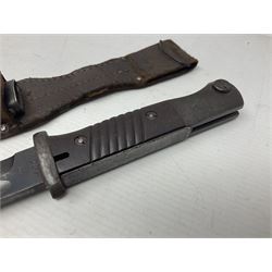 WWII German K98 Mauser bayonet by E. & F. Horster, the 24.5cm fullered blade marked 43aSW for 1943, numerous inspection marks to blade and pommel, bakelite grips and bluing to metal parts; in steel scabbard with corresponding numbers and leather frog L42cm overall