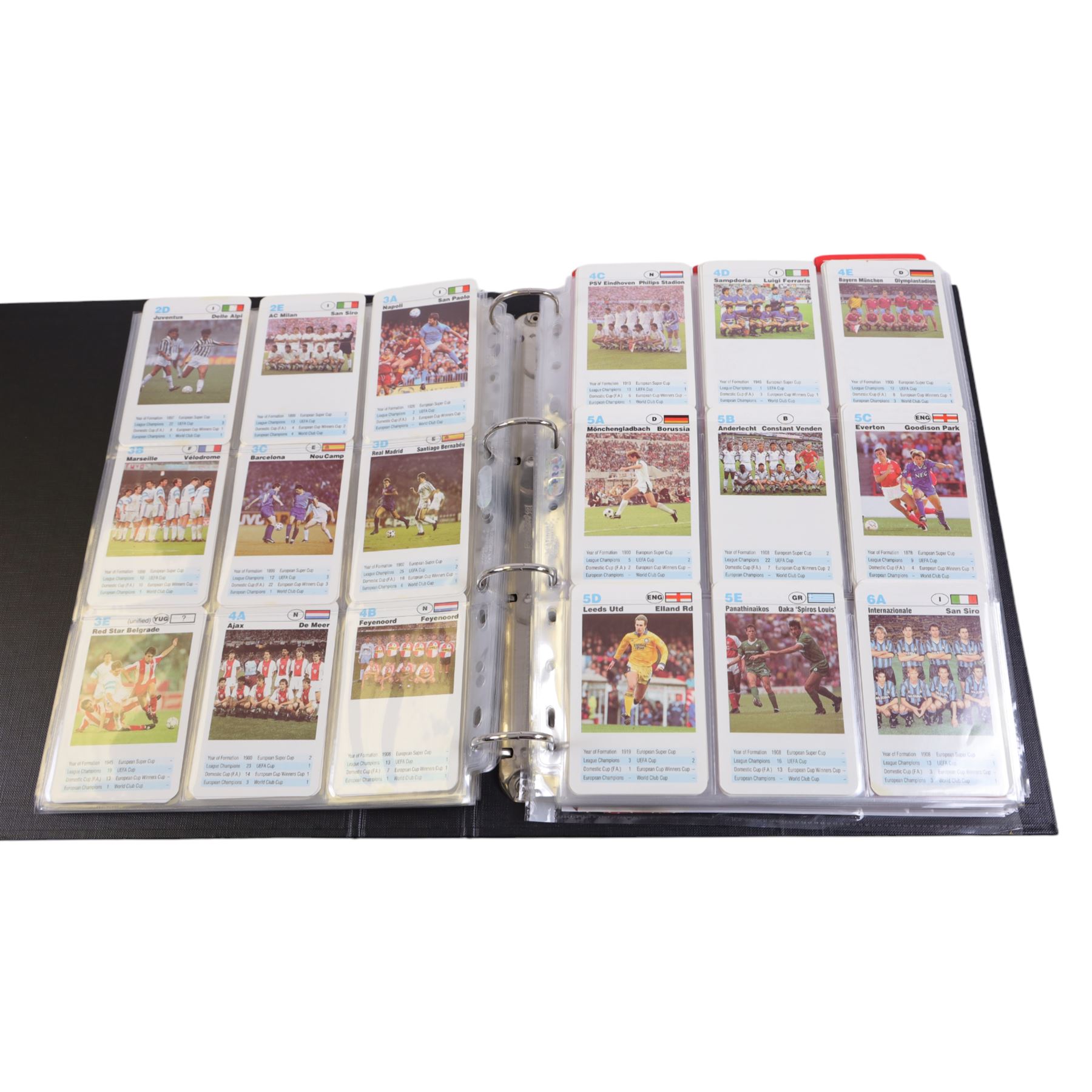 Collection of Football related trading cards, stickers and coins, including 1990 Esso World Cup Coin Collection, an empty 2010 Esso Official England Medal Collection Folder, incomplete 1990 Italy World Cup Commemorative Medal Collection, 1998 The Official England Squad Medal Collection, 1970s Topps All Stars Cards, 1992 Panini Official Football Players cards, Euro 2008 Collectors Binder and Cards, Panini 2009/10 Champions League Stickers, etc housed in four folders