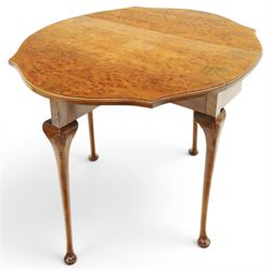 Queen Anne design walnut drop-leaf table, figured top with serpentine drop leaves, shell c...