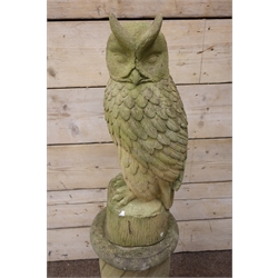  Selby Stone model of an Eagle Owl, on twist moulded circular column with stepped circular base, H117cm  
