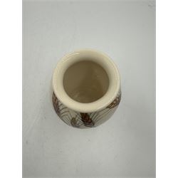 Moorcroft vase, decorated in Harvest Poppy pattern on white ground, H14cm