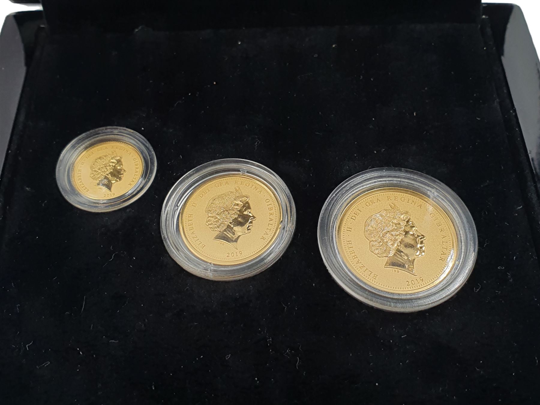 Concorde 50th Anniversary gold three coin set, comprising Queen Elizabeth II 2019 Gibraltar full, half and quarter gold sovereign coins, cased with certificates