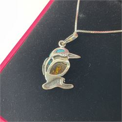 Silver Baltic Amber and Turquoise Kingfisher Pendant Necklace. Stamped 925.

This sweet little silver Kingfisher is made with Baltic Amber, also known as 'nature's time capsule' because of its prehistoric origins and ability to preserve organisms from millions of years ago. Paired with turquoise gemstones and some lovely detailing on the silver, this item makes for a very pretty piece of jewellery.  