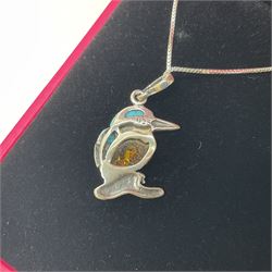 Silver Baltic Amber and Turquoise Kingfisher Pendant Necklace. Stamped 925.

This sweet little silver Kingfisher is made with Baltic Amber, also known as 'nature's time capsule' because of its prehistoric origins and ability to preserve organisms from millions of years ago. Paired with turquoise gemstones and some lovely detailing on the silver, this item makes for a very pretty piece of jewellery.  