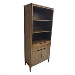 Hardwood bookcase, fitted with two open shelves over single drawer and double cupboard, retailed by Alexander Ellis of Beverley