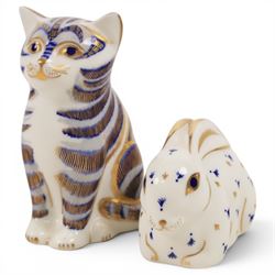 Three Royal Crown Derby paperweights, comprising Seated cat, Rabbit and Sleeping cat, all with gold stoppers 