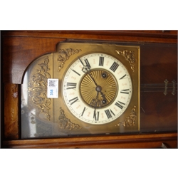  Late 19th century walnut cased Vienna wall clock with moulded eagle finial on stepped pediment over an arched top glazed door flanked by turned half columns, enclosing an ivory coloured dial with Roman numerals in brassed frame, eight day movement striking on a gong, on moulded base H122cm, and oak framed combined aneroid barometer/thermometer (2)  