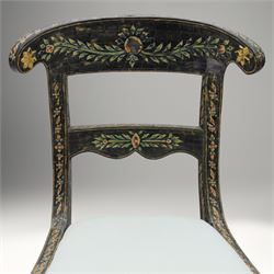 Early 20th century Anglo-Indian painted and inlaid armchairs, each with shaped top rail decorated with polychrome floral motifs above turned spindle galleries, shaped open arms and upholstered seats, on square supports with similar painted decoration