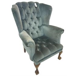Georgian design wingback armchair, traditional shape with rolled arms, upholstered in teal velvet fabric, on cabriole supports with ball and claw feet