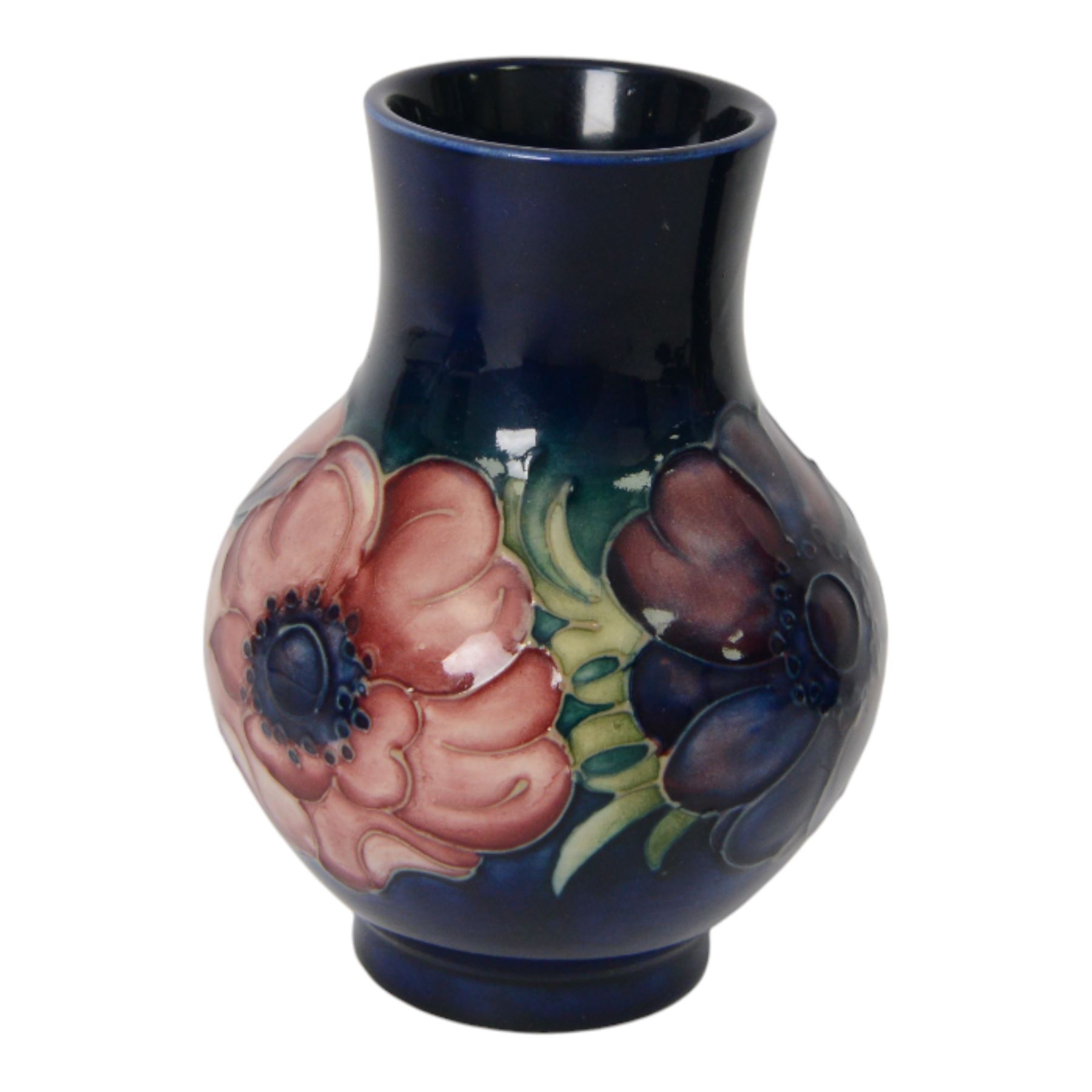 Moorcroft pansy pattern vase, of baluster form, together with Anemone pattern vase and dish, all with impressed marks beneath, pansy vase H16cm 