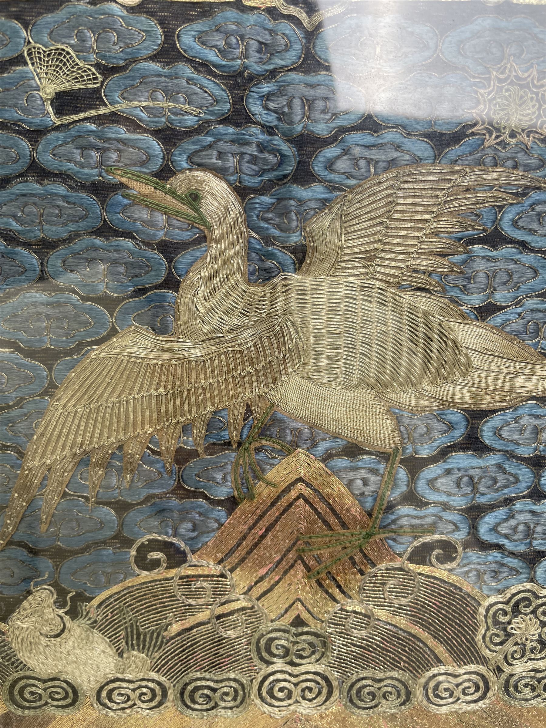 Early 20th century Chinese silk work tapestry, depicting a crane flying over a river, H30cm 