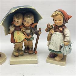 Sixteen Goebel Hummel figures, including Charlot A Young Man's Fancy, Stormy Weather and Bookworm, all with impressed and printed marks beneath