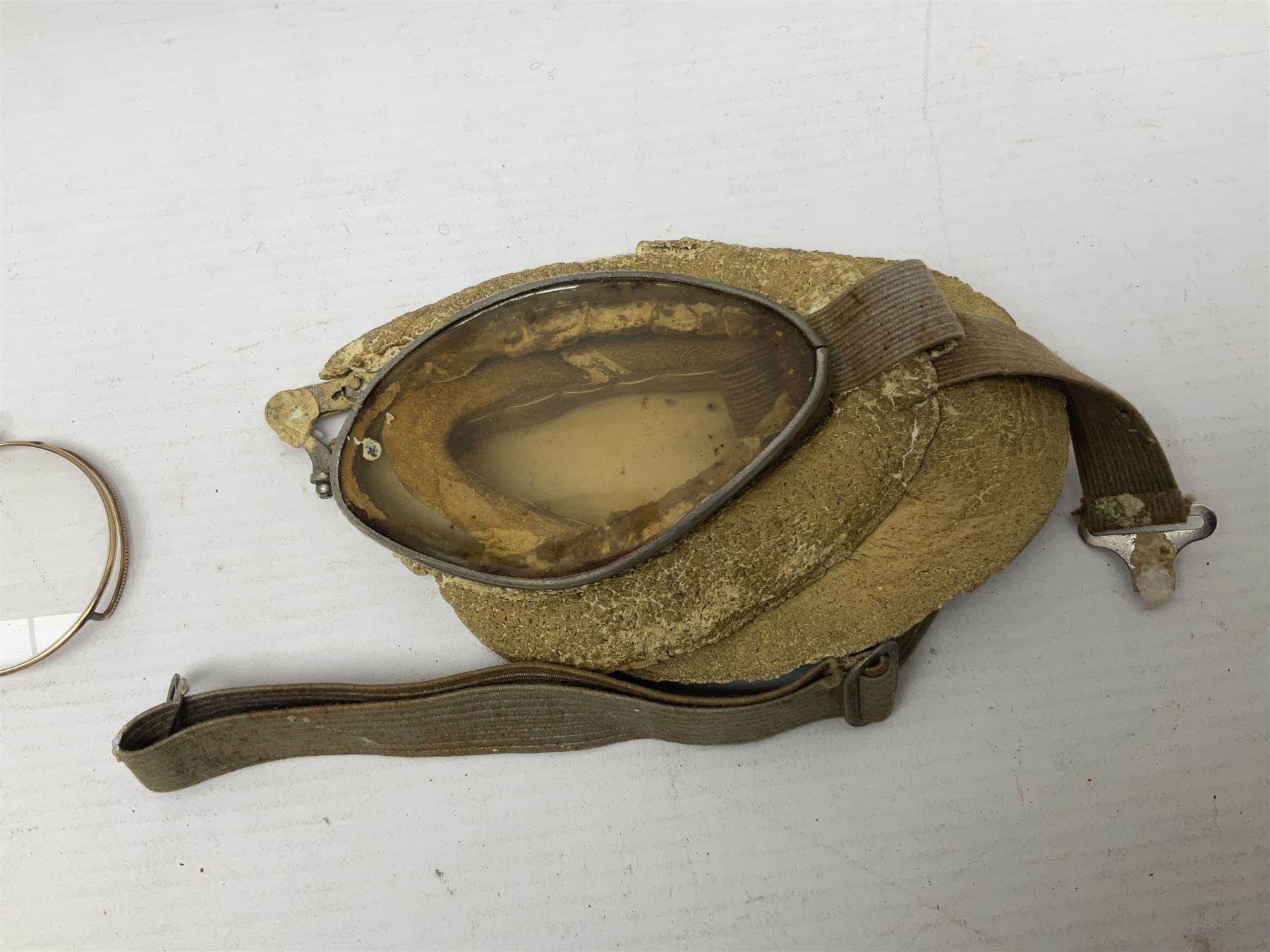 British Army Sam Brown leather belt with Turkish markings; New Zealand Land Forces officer's commission certificate dated 1919; WWII small pair of trench art brass helmet shaped scuttles; and other items
