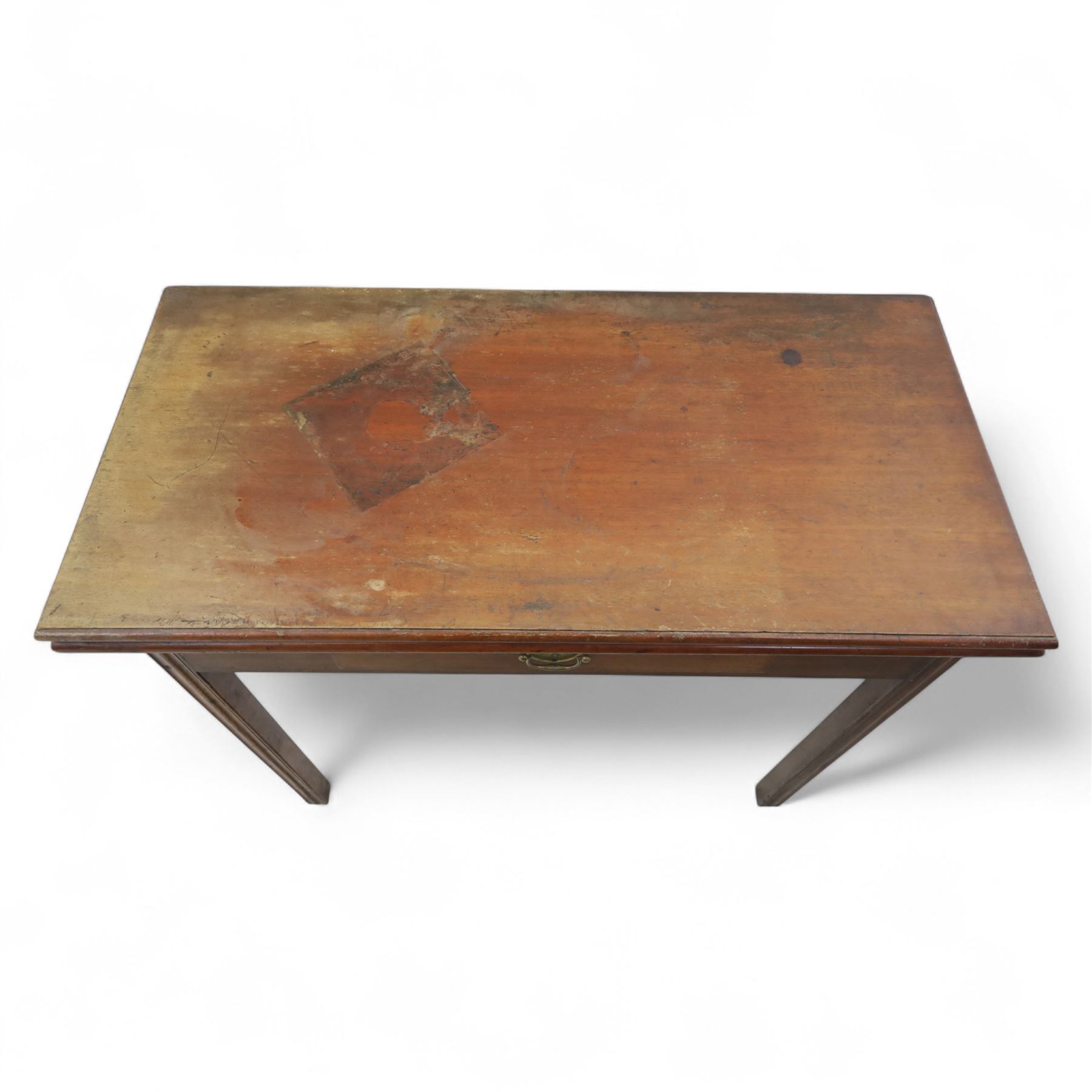 Georgian mahogany fold-over tea table, rectangular top with moulded edge over single frieze drawer with brass handle plate, on square tapering supports with gateleg