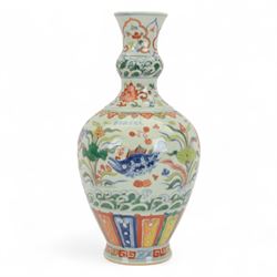 20th century Chinese doucai vase, the body of ovoid form with waisted and knopped neck, decorated with swimming fish amongst plants in underglaze blue and polychrome enamel, the body bearing spurious character mark for  Hsuan Te, H44cm