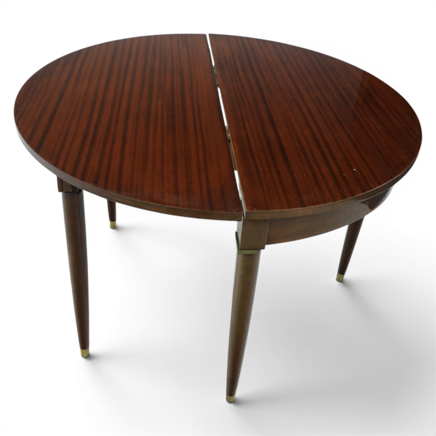 Regency design mahogany demi-lune console dining table, fold-over top extending to circular table, raised on round tapering legs