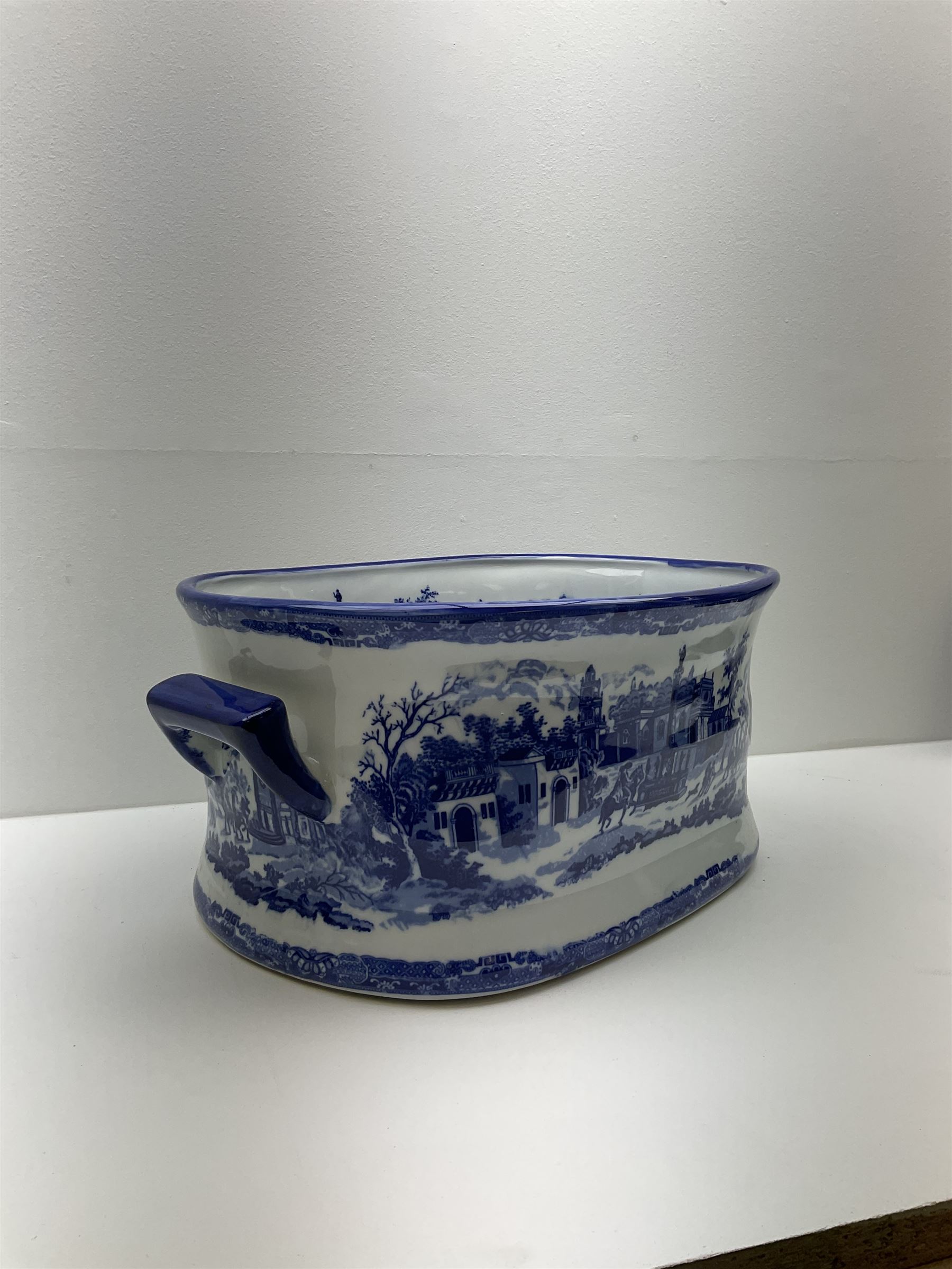 Victorian style, blue and white transfer printed footbath, decorated with town scene and with twin carry handles, L48cm