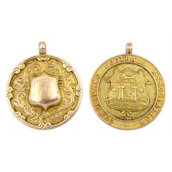 Edwardian gold 'Cumberland Football Association' fob by Vaughton & Sons, Birmingham 1909 and one other gold fob with blank cartouche, both hallmarked 9ct