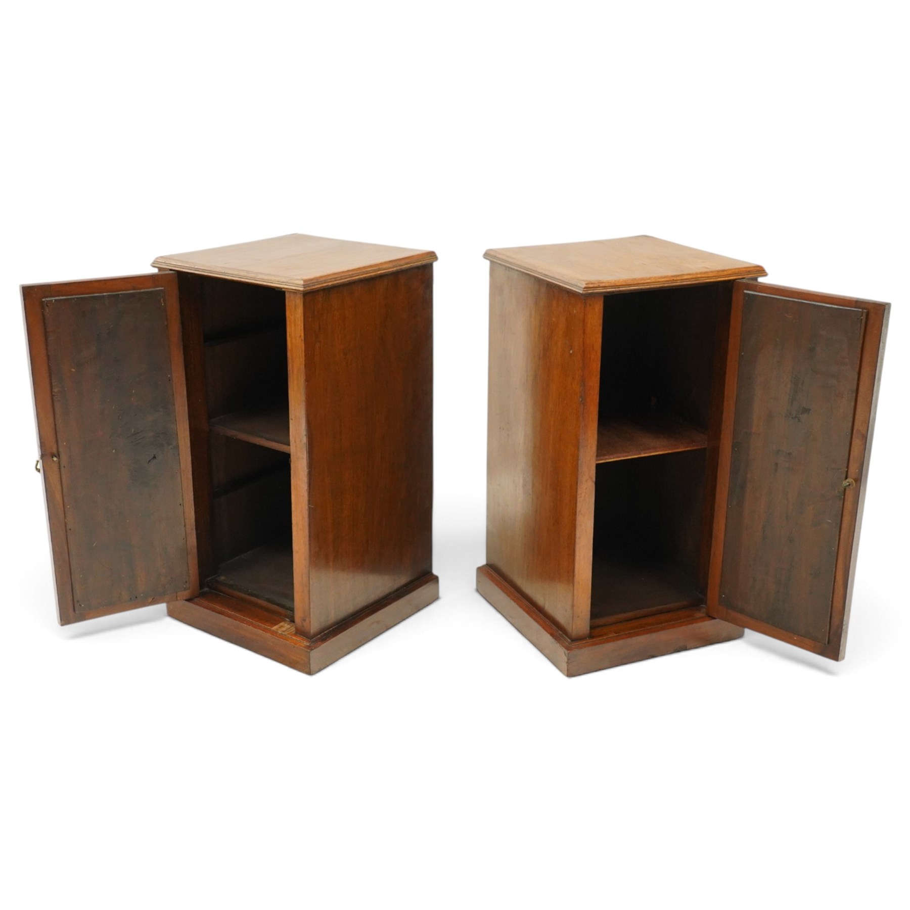 Pair of late 19th century figured walnut bedside cabinets, rectangular top with moulded edge, over a cupboard door with burr panels enclosing single shelf, on plinth base