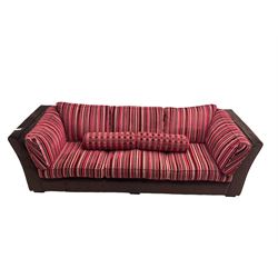 Collins & Hayes - grande three seat sofa upholstered in chocolate fabric, the loose cushions upholstered in textured fuschia stripes with contrasting spotted bolster cushions