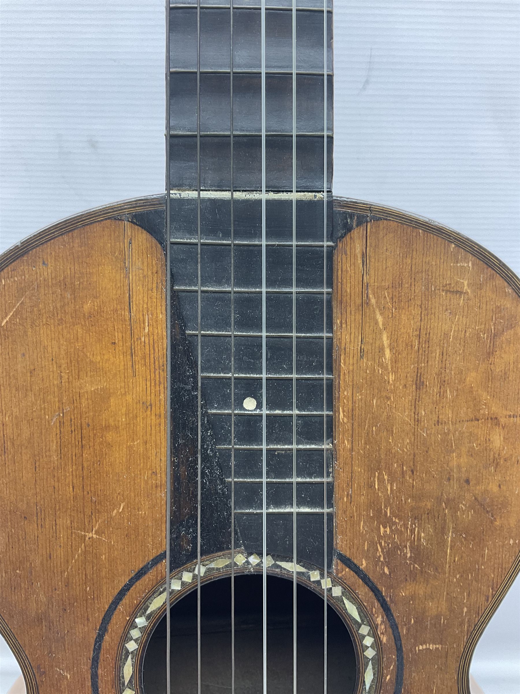 19th century Continental parlour guitar for restoration or display, with maple back and sides,  spruce top, scalloped neck and bone pegs; bears inset plaque to head 'Lapaix Paris 1830' and 'John Eastwood Teacher of the Guitar' paper label with manuscript note 'Fine Old Guitar Restored 1888 by JCB Leeds' L92cm