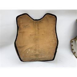 Brass bound and studded polished steel breast and back plates with leather lining and articulated brass securing shoulder straps marked RHG (?Royal Horse Guards); in canvas carrying bag marked 'CN/AA 0760' with various other marks including broad arrow; and two additional shoulder straps