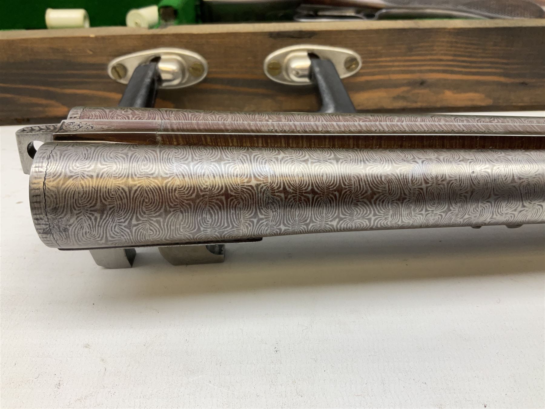 Midland Gun Company Birmingham & London 12-bore side-by-side box-lock non-ejector double barrel shotgun with 76cm damascus barrels, Prince of Wales style walnut stock with chequered grip and fore-end, top safety and engraved lock no.62160 L120cm overall; in scratch built baize lined wooden case. SHOTGUN CERTIFICATE REQUIRED.