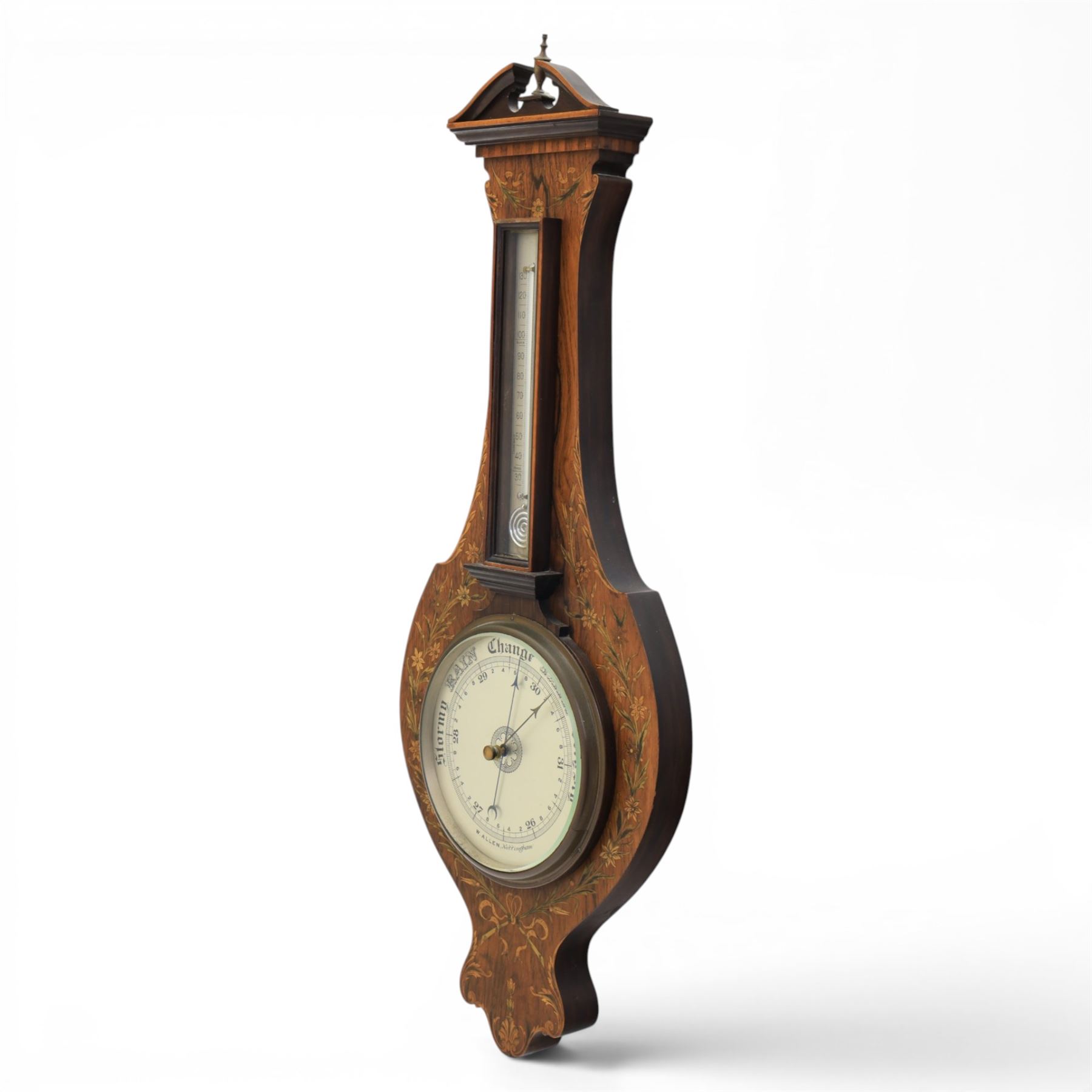Edwardian mahogany barometer, shaped case with swan neck pediment and urn finial, satinwood inlaid floral and ribbon tied decoration, fitted with silvered thermometer scale over circular aneroid dial, signed W. Allen, Nottingham