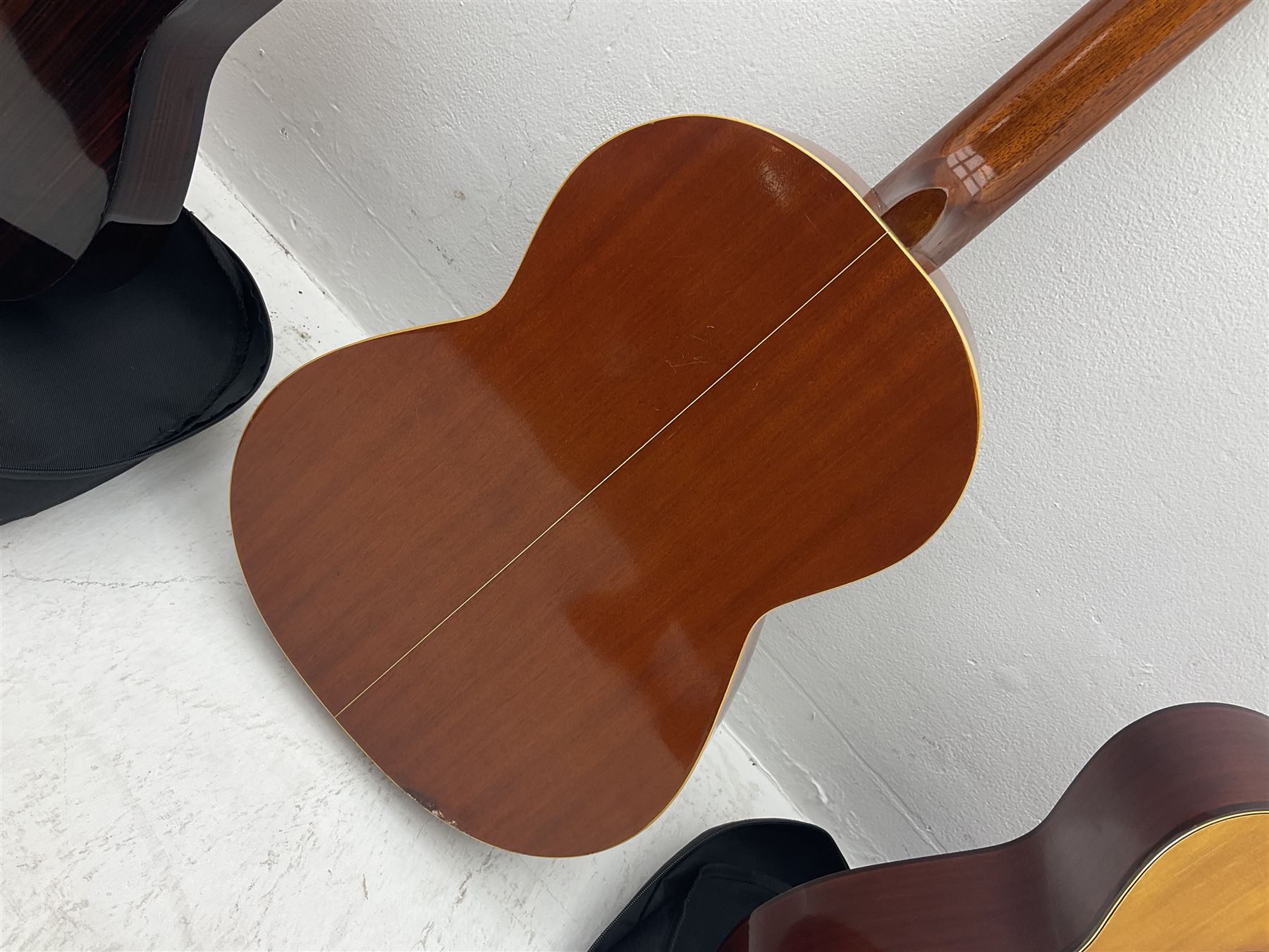 Saxon acoustic guitar Folk Model 812, serial no.43263 L102cm; Jose Ferrer El Primo small or child's size acoustic guitar, serial no.006980 L85cm; both in carrying soft cases; and Spanish Admira Concert Grande acoustic guitar (3)