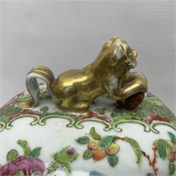 Pair of 19th century Chinese Famille Rose vases and covers, each of baluster form with twin gilt lion mask ring handles to shoulders, the flattened domed covers with gilt temple lion finials, each decorated with alternating reserves of bijin and attendants, and birds and butterflies amongst blossoming peonies, against a gilt ground profusely decorated with stylised scrolls, H32.5cm