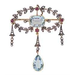 Edwardian silver and gold milgrain set aquamarine, rose cut diamond and ruby brooch / pendant, rectangular cut aquamarine, set within a diamond laurel wreath and ruby surround, with two diamond drops either side, suspending a pear cut aquamarine and diamond pendant, total aquamarine weight approx 4.40 carat